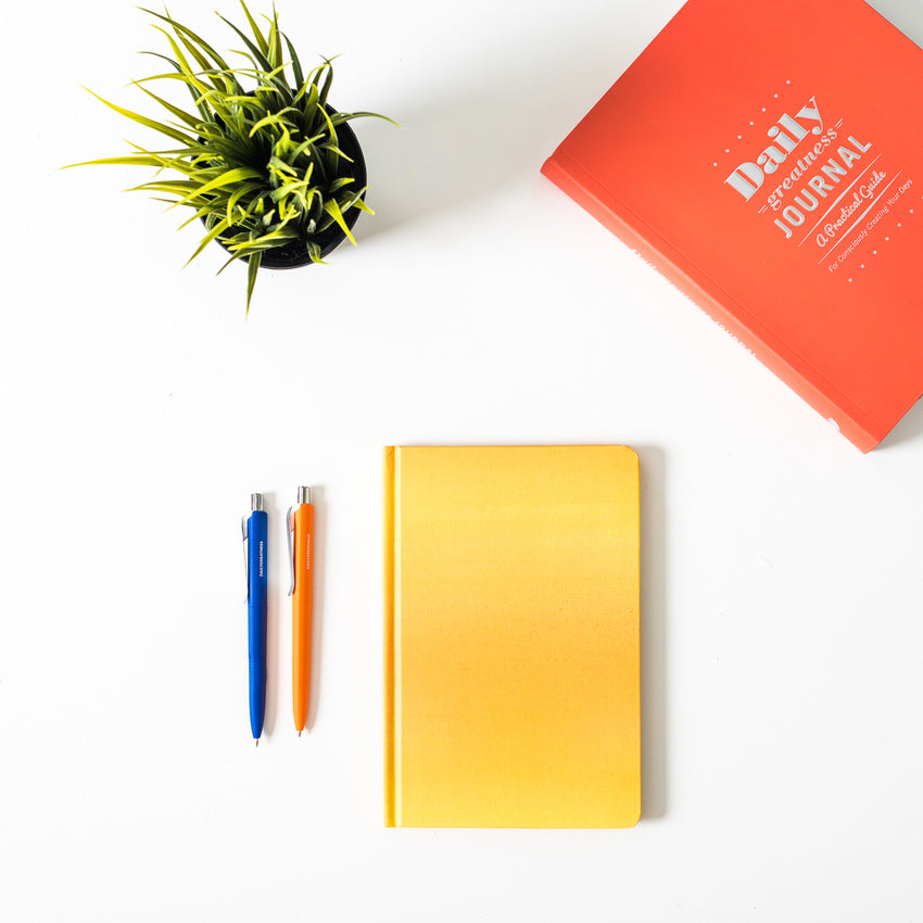 Bundle - Dailygreatness Original, Deskpad, and Yellow Notebook