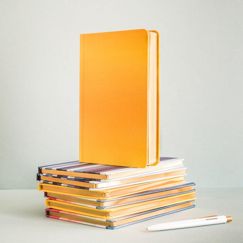 Bundle - Dailygreatness Original, Deskpad, and Yellow Notebook